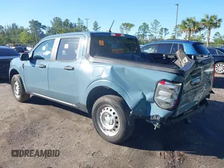 2023 Ford Maverick XL with VIN 3FTTW8E32PRA56304, listed as a IAAI auction lot 41147511 with 27,787 mi miles and . Bid and sale history available at DreamBid. Image 3.