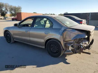 2002 Mitsubishi Galant ES z VIN 4A3AA46G62E159170, wystawiony jako Copart lot #87966255 z przebiegiem 91 334 mil mil oraz Szkoda całkowita • Salvage title. Historia ofert i sprzedaży dostępna na DreamBid. Obrazek 2.