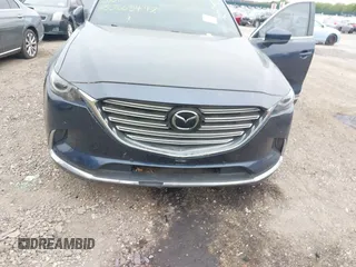2018 Mazda CX-9 Grand Touring with VIN JM3TCBDY8J0209737, listed as a IAAI auction lot 42374826 with Not provided miles and . Bid and sale history available at DreamBid. Image 6.