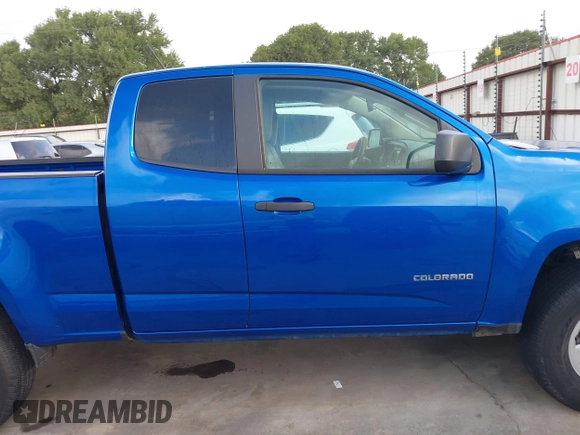 2018 Chevrolet Colorado 2WD Work Truck z VIN 1GCHSBEA8J1300911, wystawiony jako IAAI lot #42543557 z przebiegiem 73 896 mil mil oraz . Historia ofert i sprzedaży dostępna na DreamBid. Obrazek 13.