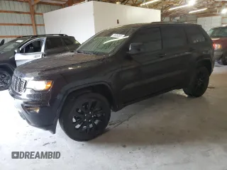 2020 Jeep Grand Cherokee Laredo with VIN 1C4RJFAG6LC311731, listed as a Copart auction lot 58380385 with 79,938 mi miles and Salvage title. Bid and sale history available at DreamBid. Image 1.