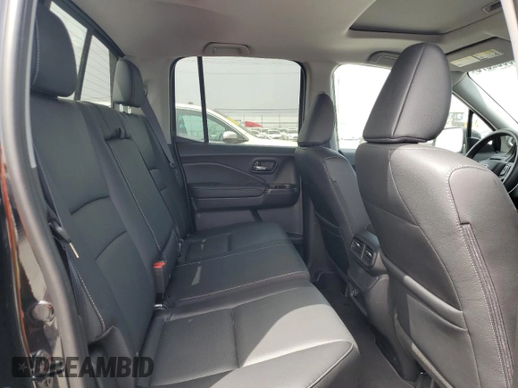 2025 Honda Ridgeline RTL with VIN 5FPYK3F52SB014785, listed as a Copart auction lot 59982875 with 2,341 mi miles and Salvage title. Bid and sale history available at DreamBid. Image 10.