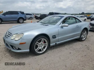 2007 Mercedes-Benz SL 550 z VIN WDBSK71F87F123890, wystawiony jako Copart lot #55453355 z przebiegiem Nie podano mil oraz Szkoda całkowita • Salvage title. Historia ofert i sprzedaży dostępna na DreamBid. Obrazek 1.