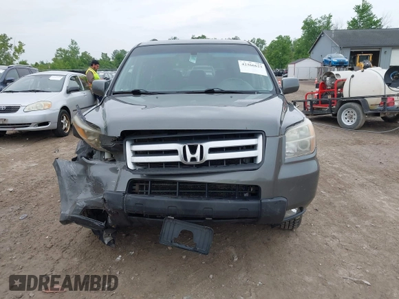 2007 Honda Pilot EX-L z VIN 2HKYF18587H511816, wystawiony jako IAAI lot #42366623 z przebiegiem 170 866 mil mil oraz . Historia ofert i sprzedaży dostępna na DreamBid. Obrazek 12.