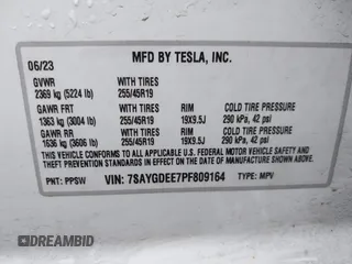 2023 Tesla Model Y Long Range with VIN 7SAYGDEE7PF809164, listed as a IAAI auction lot 41828974 with 31,772 mi miles. Bid and sale history available at carsss.com. Image 9.