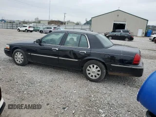 2005 Mercury Grand Marquis LS Premium z VIN 2MEFM75W25X627343, wystawiony jako Copart lot #52307095 z przebiegiem 213 331 mil mil oraz Tytuł czysty. Historia ofert i sprzedaży dostępna na DreamBid. Obrazek 2.