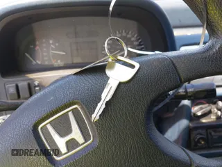 1991 Honda Civic z VIN 1HGED3649ML019481, wystawiony jako IAAI lot #42143741 z przebiegiem 352 104 mil mil oraz . Historia ofert i sprzedaży dostępna na DreamBid. Obrazek 11.