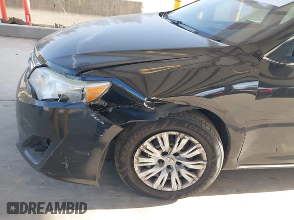 2012 Toyota Camry L z VIN 4T4BF1FK8CR271280, wystawiony jako IAAI lot #42229436 z przebiegiem 165 620 mil mil oraz . Historia ofert i sprzedaży dostępna na DreamBid. Obrazek 6.