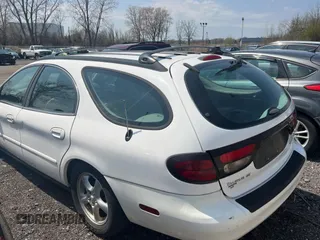 2003 Ford Taurus SE Standard z VIN 1FAFP58283A155067, wystawiony jako Copart lot #54555045 z przebiegiem 159 296 mil mil oraz Tytuł czysty. Historia ofert i sprzedaży dostępna na DreamBid. Obrazek 3.