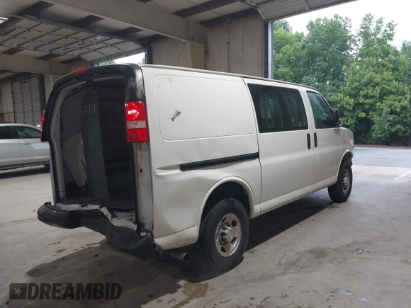 2021 Chevrolet Express Cargo with VIN 1GCWGAFP4M1160480, listed as a IAAI auction lot 42621437 with 99,142 mi miles and . Bid and sale history available at DreamBid. Image 4.