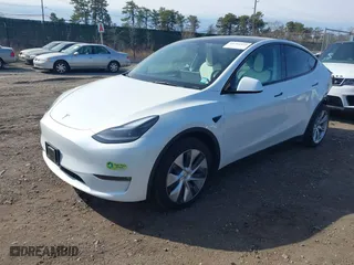 2023 Tesla Model Y Long Range with VIN 7SAYGDEE6PF912074, listed as a IAAI auction lot 41761834 with 18,250 mi miles. Bid and sale history available at carsss.com. Image 20.