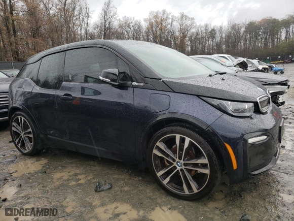 2019 BMW i3 s with VIN WBY8P8C58K7E75265, listed as a Copart auction lot 84561564 with 77,392 mi miles and Salvage Title. Bid and sale history available at carsss.com. Image 4.