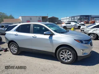 2021 Chevrolet Equinox LT with VIN 3GNAXKEV1MS126504, listed as a IAAI auction lot 41833363 with 76,137 mi miles. Bid and sale history available at carsss.com. Image 14.