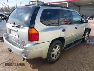 2005 GMC Envoy SLE with VIN 1GKDS13S252284455, listed as a IAAI auction lot 41455172 with 171,559 mi miles and . Bid and sale history available at DreamBid. Image 4.