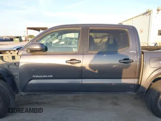 2021 Toyota Tacoma SR z VIN 3TYAX5GN2MT020997, wystawiony jako IAAI lot #40991578 z przebiegiem 81 509 mil mil oraz . Historia ofert i sprzedaży dostępna na DreamBid. Obrazek 14.