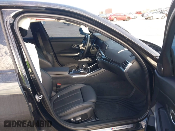 2022 BMW 3 Series M340i xDrive with VIN WBA5U9C08NFM68599, listed as a IAAI auction lot 41260340 with Not Provided miles and . Bid and sale history available at DreamBid. Image 5.