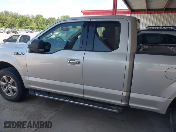 2019 Ford F-150 XL with VIN 1FTFX1E59KKC12581, listed as a IAAI auction lot 42534086 with 152,955 mi miles and . Bid and sale history available at DreamBid. Image 14.