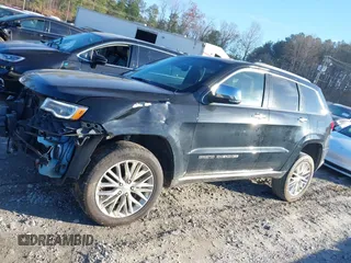 2018 Jeep Grand Cherokee Summit with VIN 1C4RJFJG1JC211047, listed as a IAAI auction lot 41133865 with 66,588 mi miles and . Bid and sale history available at DreamBid. Image 14.