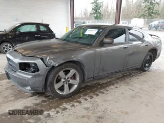 2010 Dodge Charger SXT with VIN 2B3CA3CV1AH250204, listed as a IAAI auction lot 41692787 with 111,757 mi miles. Bid and sale history available at carsss.com. Image 2.