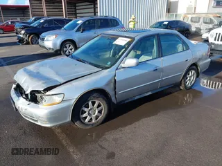 2002 Honda Accord SE with VIN 1HGCG56712A064900, listed as a IAAI auction lot 42184540 with Not provided miles and . Bid and sale history available at DreamBid. Image 2.