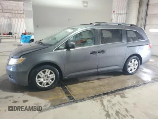 2012 Honda Odyssey LX z VIN 5FNRL5H21CB009359, wystawiony jako Copart lot #57669225 z przebiegiem 162 757 mil mil oraz Szkoda całkowita • Salvage title. Historia ofert i sprzedaży dostępna na DreamBid. Obrazek 1.