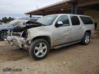 2007 Chevrolet Suburban LTZ with VIN 1GNFC16027J168913, listed as a Copart auction lot 44584445 with 233,690 mi miles and Salvage Title. Bid and sale history available at carsss.com. Image 1.