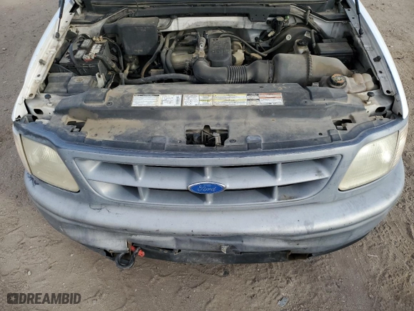 1997 Ford F-150 Standard with VIN 1FTDF1726VKC67880, listed as a Copart auction lot 86217364 with 242,124 mi miles and Salvage Title. Bid and sale history available at carsss.com. Image 11.