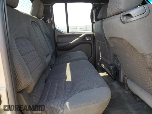 2005 Nissan Frontier LE z VIN 1N6AD07W95C417736, wystawiony jako Copart lot #55112835 z przebiegiem 217 251 mil mil oraz Szkoda całkowita • Salvage title. Historia ofert i sprzedaży dostępna na DreamBid. Obrazek 10.