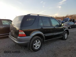 1999 Mercedes-Benz M-Class with VIN 4JGAB54E3XA092934, listed as a Copart auction lot 80631164 with 180,734 mi miles and Salvage Title. Bid and sale history available at carsss.com. Image 3.