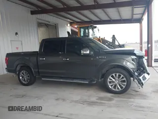 2015 Ford F-150 XL with VIN 1FTEW1CF1FKD55749, listed as a IAAI auction lot 41242324 with 164,415 mi miles. Bid and sale history available at carsss.com. Image 13.