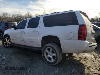 2013 Chevrolet Suburban LT with VIN 1GNSKJE74DR239851, listed as a Copart auction lot 44856425 with 203,074 mi miles and Salvage Title. Bid and sale history available at DreamBid. Image 2.