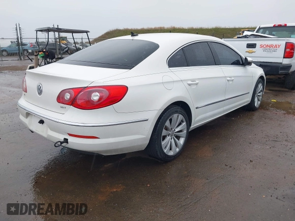 2010 Volkswagen CC Sport with VIN WVWNN7AN6AE552567, listed as a IAAI auction lot 41470802 with 117,539 mi miles. Bid and sale history available at carsss.com. Image 4.
