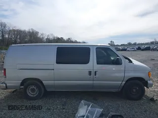 1998 Ford Econoline Cargo with VIN 1FTRE1428WHB30628, listed as a IAAI auction lot 41706164 with 153,223 mi miles. Bid and sale history available at carsss.com. Image 13.