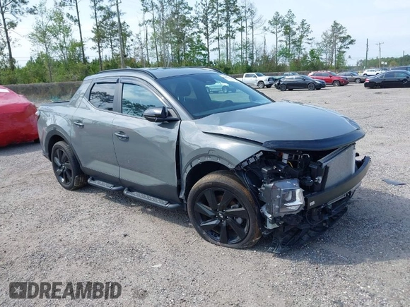 2023 Hyundai Santa Cruz Night Edition z VIN 5NTJCDAF0PH054192, wystawiony jako IAAI lot #40734723 z przebiegiem 9 700 mil mil oraz . Historia ofert i sprzedaży dostępna na DreamBid. Obrazek 1.