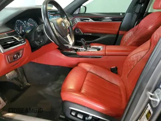 2017 BMW 7 Series 750i with VIN WBA7F0C31HGM22359, listed as a Copart auction lot 56306875 with 90,642 mi miles and Salvage title. Bid and sale history available at DreamBid. Image 7.
