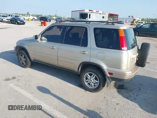 2000 Honda CR-V SE with VIN JHLRD1878YC048555, listed as a IAAI auction lot 42123556 with 164,934 mi miles. Bid and sale history available at carsss.com. Image 3.