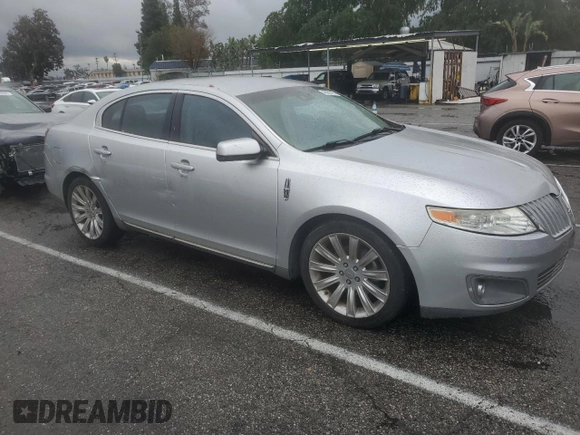 2012 Lincoln MKS with VIN 1LNHL9DR5CG804793, listed as a Copart auction lot 48966795 with 111,097 mi miles and Clean Title. Bid and sale history available at DreamBid. Image 4.