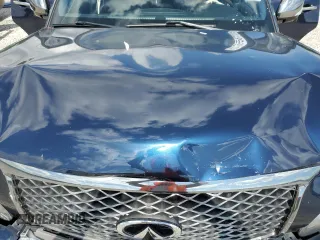 2016 Infiniti QX80 Limited with VIN JN8AZ2NE3G9120976, listed as a Copart auction lot 56722355 with 123,144 mi miles and Salvage title. Bid and sale history available at DreamBid. Image 12.
