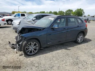 2014 BMW X1 sDrive28i with VIN WBAVM1C51EVW56657, listed as a Copart auction lot 52174675 with 0 mi miles and Salvage Title. Bid and sale history available at carsss.com. Image 1.