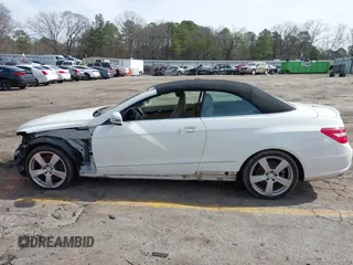 2011 Mercedes-Benz E-Class E 550 with VIN WDDKK7CF4BF093607, listed as a IAAI auction lot 41596557 with 128,548 mi miles. Bid and sale history available at carsss.com. Image 14.