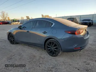 2022 Mazda 3 Carbon Edition z VIN 3MZBPACL0NM300509, wystawiony jako Copart lot #82294524 z przebiegiem 43 367 mil mil oraz Szkoda całkowita • Salvage title. Historia ofert i sprzedaży dostępna na DreamBid. Obrazek 2.