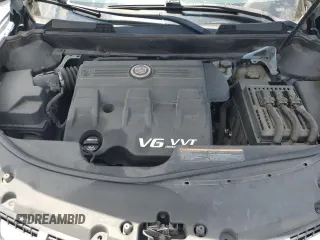 2014 Cadillac SRX Premium Collection z VIN 3GYFNGE30ES627895, wystawiony jako Copart lot #58605985 z przebiegiem 49 300 mil mil oraz Szkoda całkowita • Salvage title. Historia ofert i sprzedaży dostępna na DreamBid. Obrazek 12.