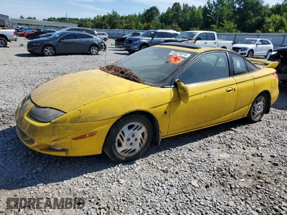 2001 Saturn SC z VIN 1G8ZR12781Z311096, wystawiony jako Copart lot #60574014 z przebiegiem Nie podano mil oraz Tytuł czysty. Historia ofert i sprzedaży dostępna na DreamBid. Obrazek 1.