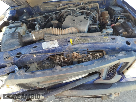 2006 Ford Ranger STX z VIN 1FTYR44E46PA38871, wystawiony jako Copart lot #57675114 z przebiegiem 264 692 mil mil oraz Szkoda całkowita • Salvage title. Historia ofert i sprzedaży dostępna na DreamBid. Obrazek 11.