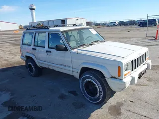 1999 Jeep Cherokee Sport with VIN 1J4FF68S0XL628564, listed as a IAAI auction lot 41508373 with 244,596 mi miles and . Bid and sale history available at DreamBid. Image 1.