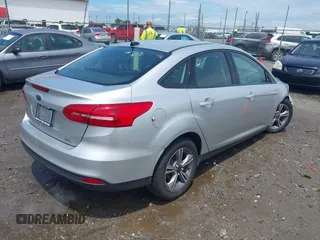 2017 Ford Focus SE with VIN 1FADP3FE4HL295573, listed as a IAAI auction lot 39562568 with 96,939 mi miles and . Bid and sale history available at carsss.com. Image 4.