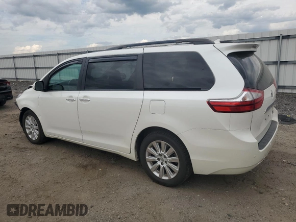 2015 Toyota Sienna Limited with VIN 5TDDK3DCXFS114465, listed as a Copart auction lot 54155605 with 105,937 mi miles and Salvage Title. Bid and sale history available at DreamBid. Image 2.