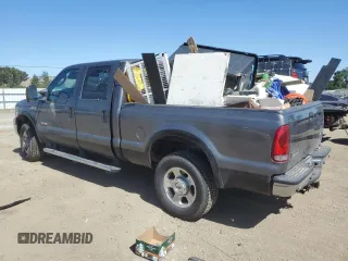 2007 Ford F-250 XL with VIN 1FTSW21P57EA59900, listed as a Copart auction lot 58787085 with 216,385 mi miles and Salvage title. Bid and sale history available at DreamBid. Image 2.