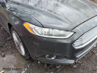 2013 Ford Fusion Titanium with VIN 3FA6P0K99DR340129, listed as a IAAI auction lot 41956835 with 105,730 mi miles. Bid and sale history available at carsss.com. Image 6.