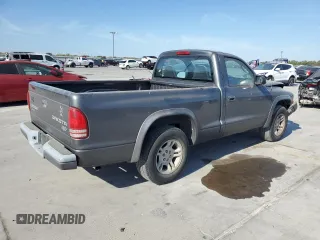 2003 Dodge Dakota with VIN 1D7FL16X13S189963, listed as a Copart auction lot 77114344 with 100,127 mi miles and Salvage Title. Bid and sale history available at carsss.com. Image 3.